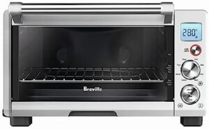Breville Smart Oven Compact Convection BOV670BSS in brushed stainless steel, featuring a compact design and advanced convection technology.  