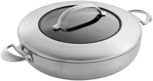 Scanpan SPN65113 32cm CTX Chef Pan with Lid in Silver/Black on a stovetop