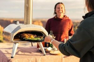 Ooni Karu 12 Multi-Fuel Outdoor Pizza Oven – Portable wood and gas pizza oven for authentic stone-baked pizzas in the backyard.