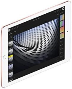 Apple iPad Pro Tablet (256GB, Wi-Fi, 9.7") Rose (Refurbished) in hand