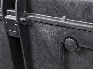 Black weatherproof and shockproof hard case with wheels, featuring IP67 water and dust protection and customizable foam interior.  