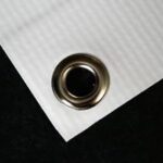 Heavy-duty vinyl "For Sale By Owner" banner with grommets.